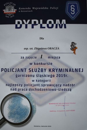 dyplom za zajęcie I miejsca z logo Policji i służby kryminalnej